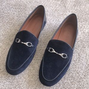 Coach loafers.
